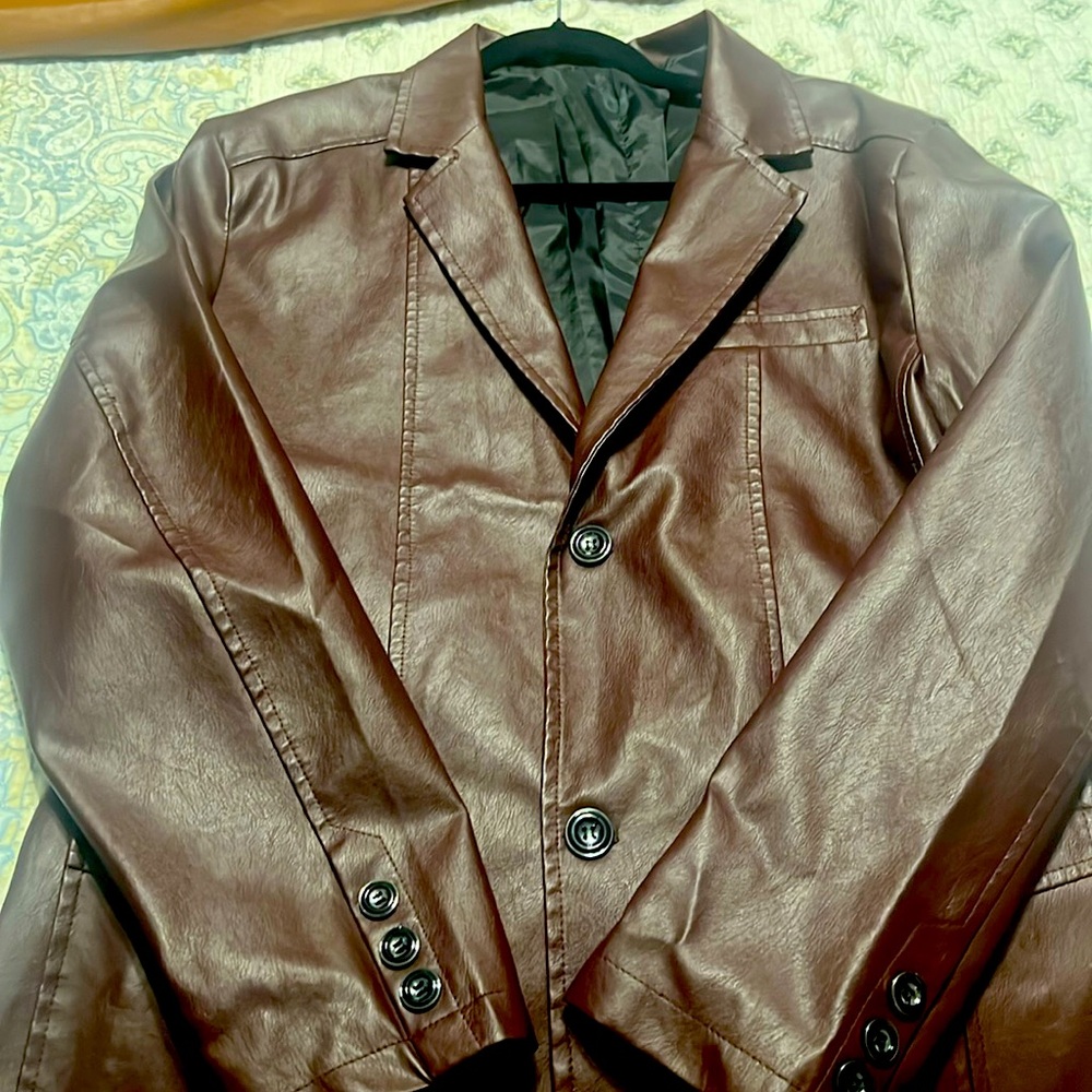 Two size large burgundy and camel color jackets, both are brand new.
